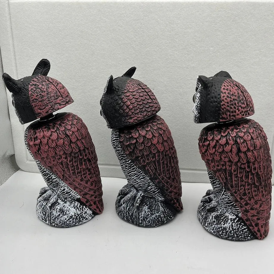 PE plastic artificial owl bird deterrent ornament with shaking head in outdoor garden setting