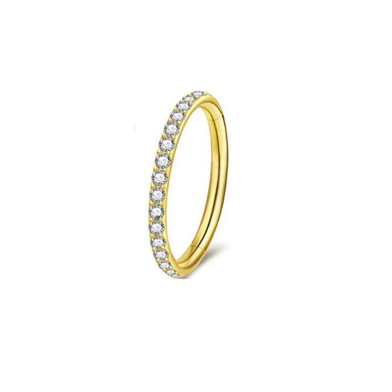 Stainless steel seamless nose ring in round shape showing colour options of black, gold, rose gold, and steel.