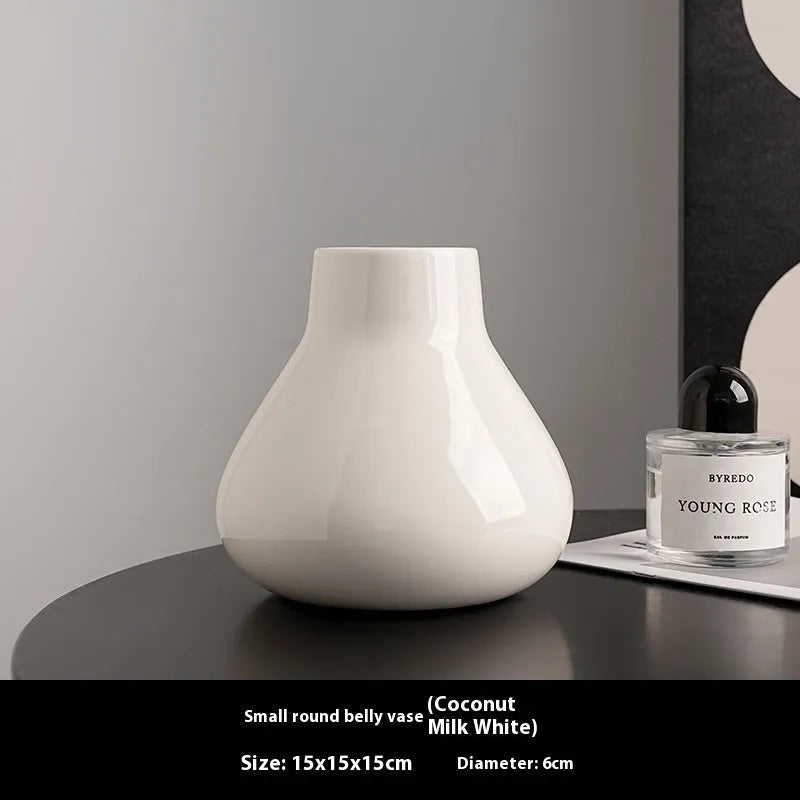 Ceramic decorative vase with glass surface in black or white colour with round belly French design