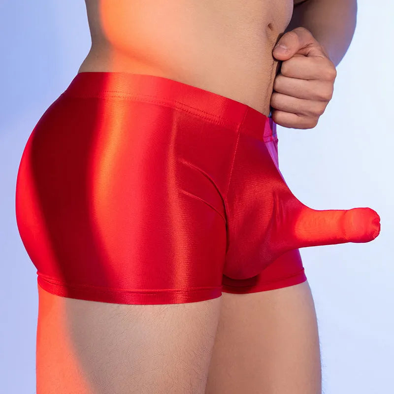 Men's boxers with elephant nose print in red nylon fabric showing mid-waist fit