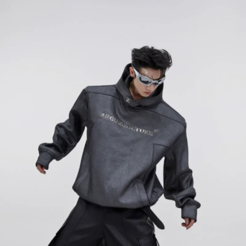 Men's black hooded sweater with heavy shoulder pads and silver metal-effect 3D printing detail.