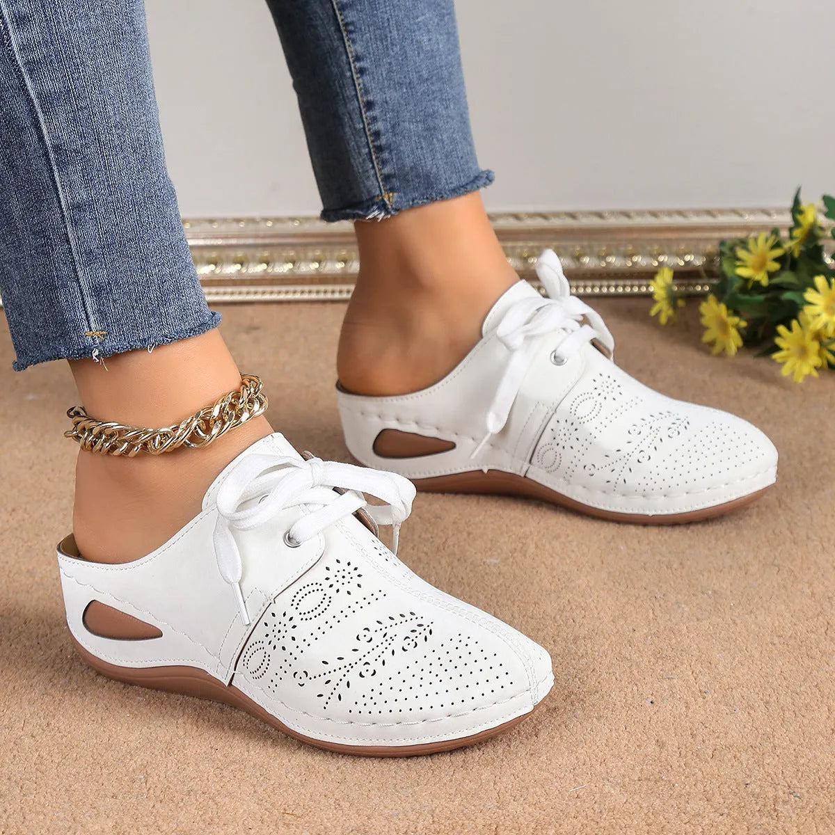 Women's summer baotou lace-up slippers with hollow-out wedge sole in a light grey colour.