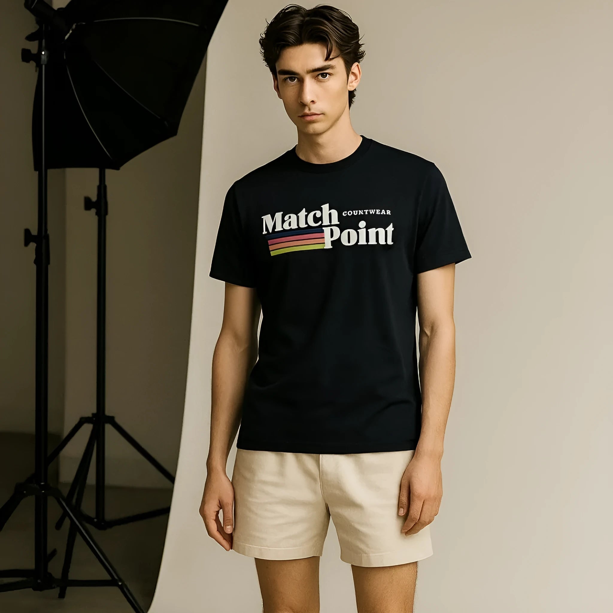 Black men's casual t-shirt with a digital text pattern print on the front, showing short sleeves and a round neck.