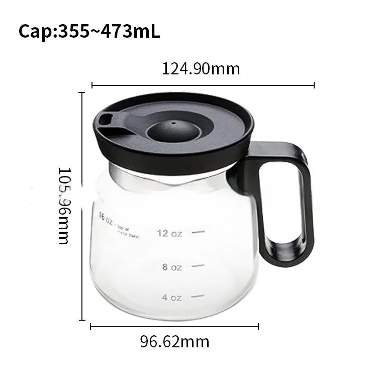 Transparent borosilicate glass coffee maker with a black silicone cover on its lid.