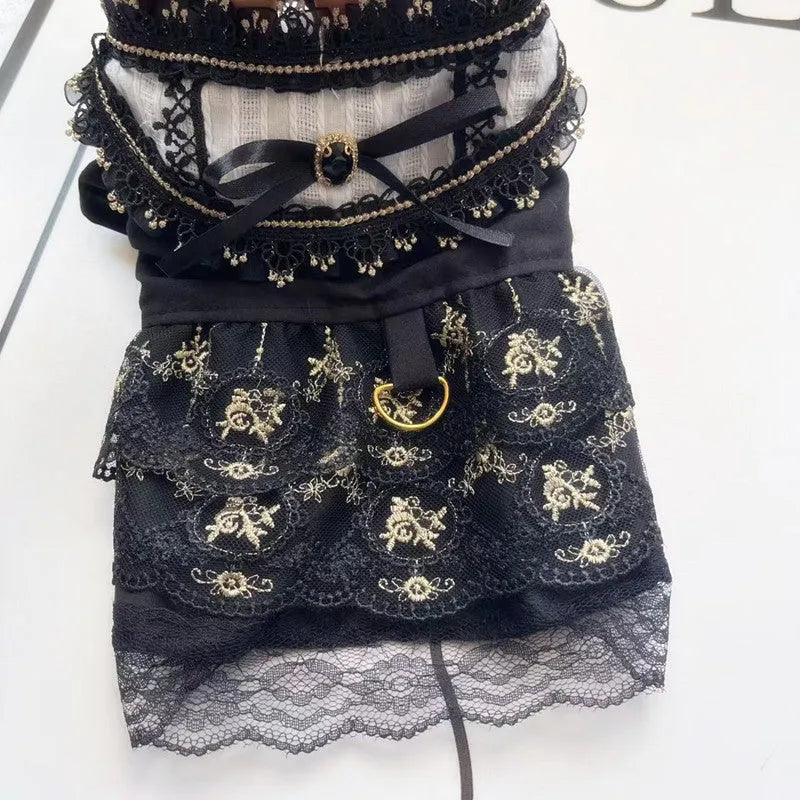 Golden gothic princess costume dress for a small dog or cat on a hanger.