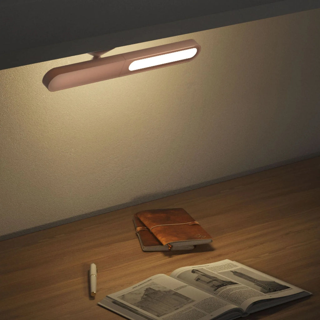 Geometric USB desk lamp with magnetic suction base for wall mounting in white colour