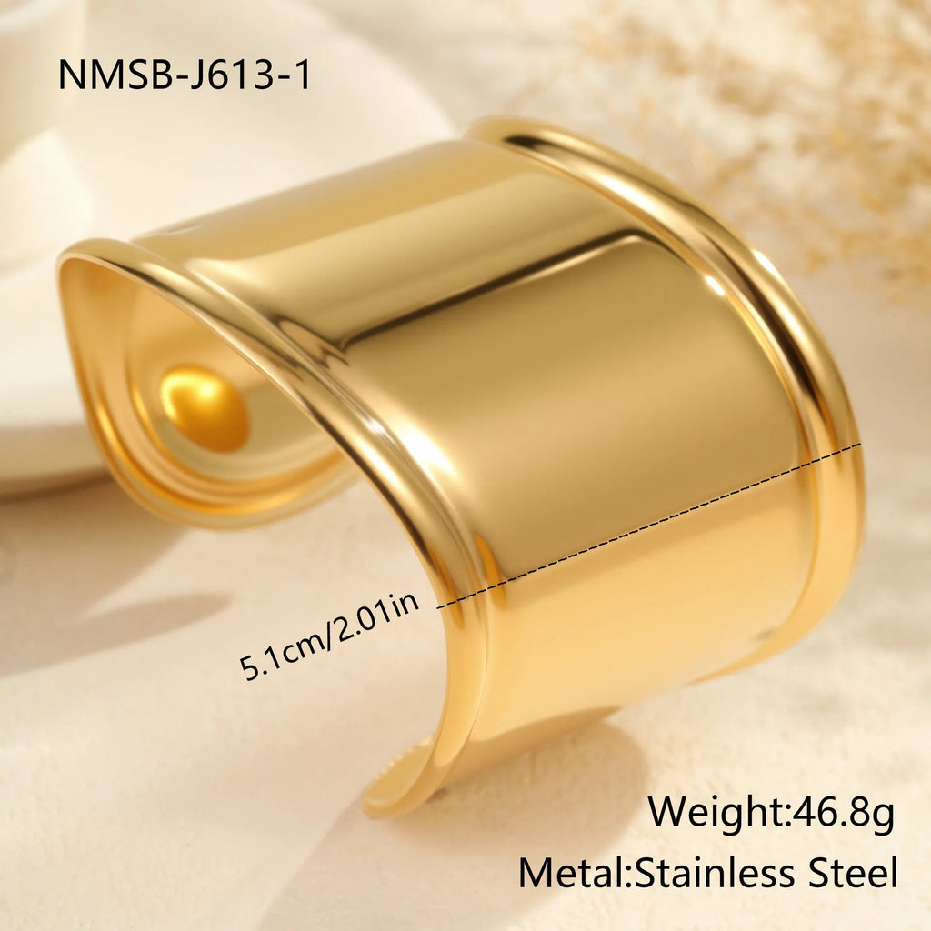 Women's stainless steel bracelet with 18K gold plating featuring wave geometric design