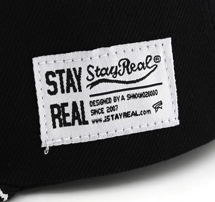 Cotton baseball cap with embroidered letters in adjustable dome crown style