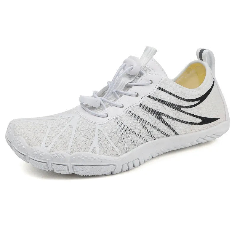 Breathable men's and women's low-top running shoes in a colour option with a lace-up front and rubber sole.