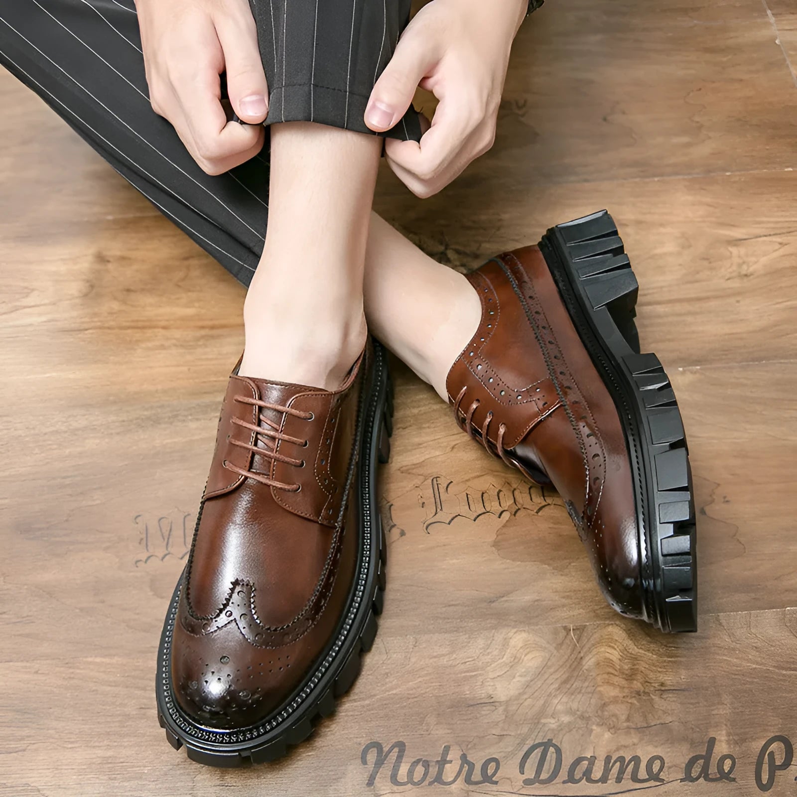 Men's black business brogue leather shoes with round toe design on white background