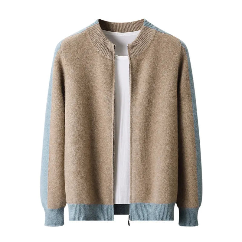 Man wearing a dark blue half turtleneck zip cardigan, a thick wool-blend sweater with a loose fit.