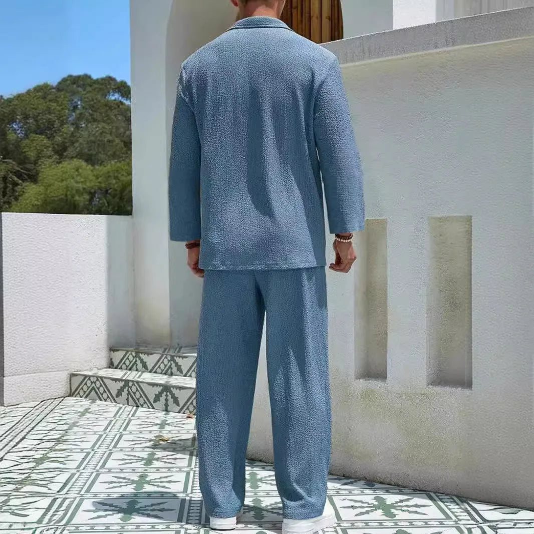 Men's casual shirt and trouser suit set in polyester fabric available in four colours.