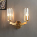 Modern minimalist copper wall lamp with single head design mounted on a wall.