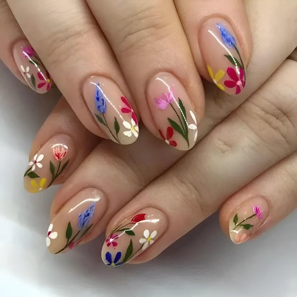Almond-shaped removable nail art with floral patterns including roses and tulips