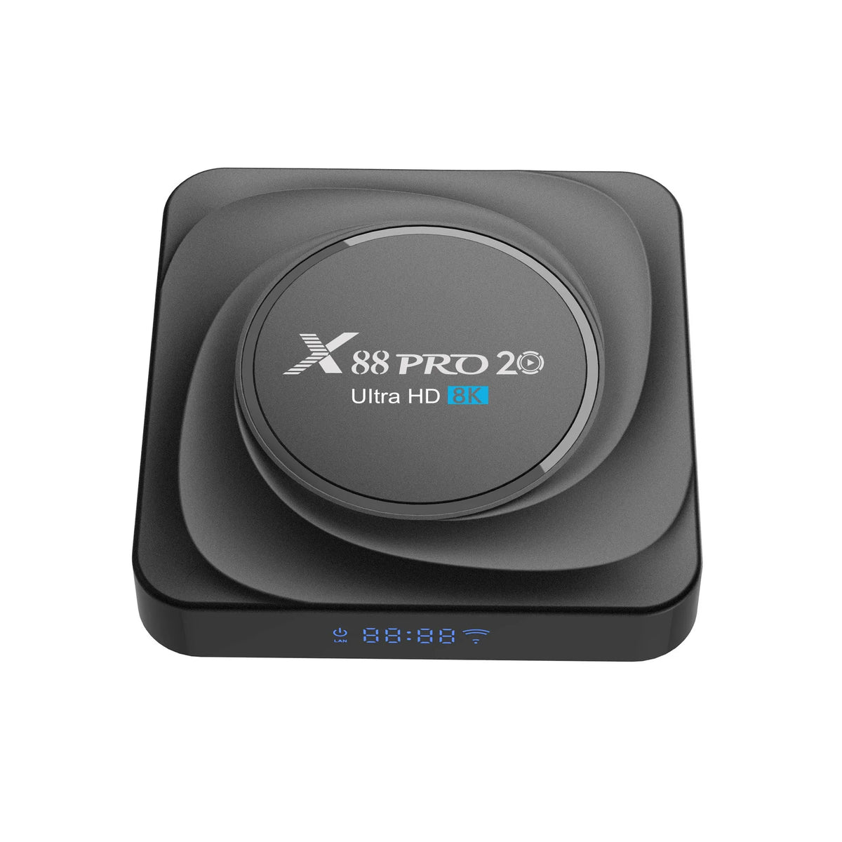 Compact black Android 11 TV box with HDMI port, remote control, and power supply on a wooden surface.