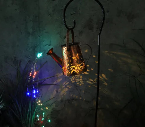 Solar garden lamp with butterfly pattern iron construction and tapered design
