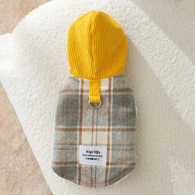 Blue corduroy hooded vest for pets with a grid pattern and traction elements on the hood.