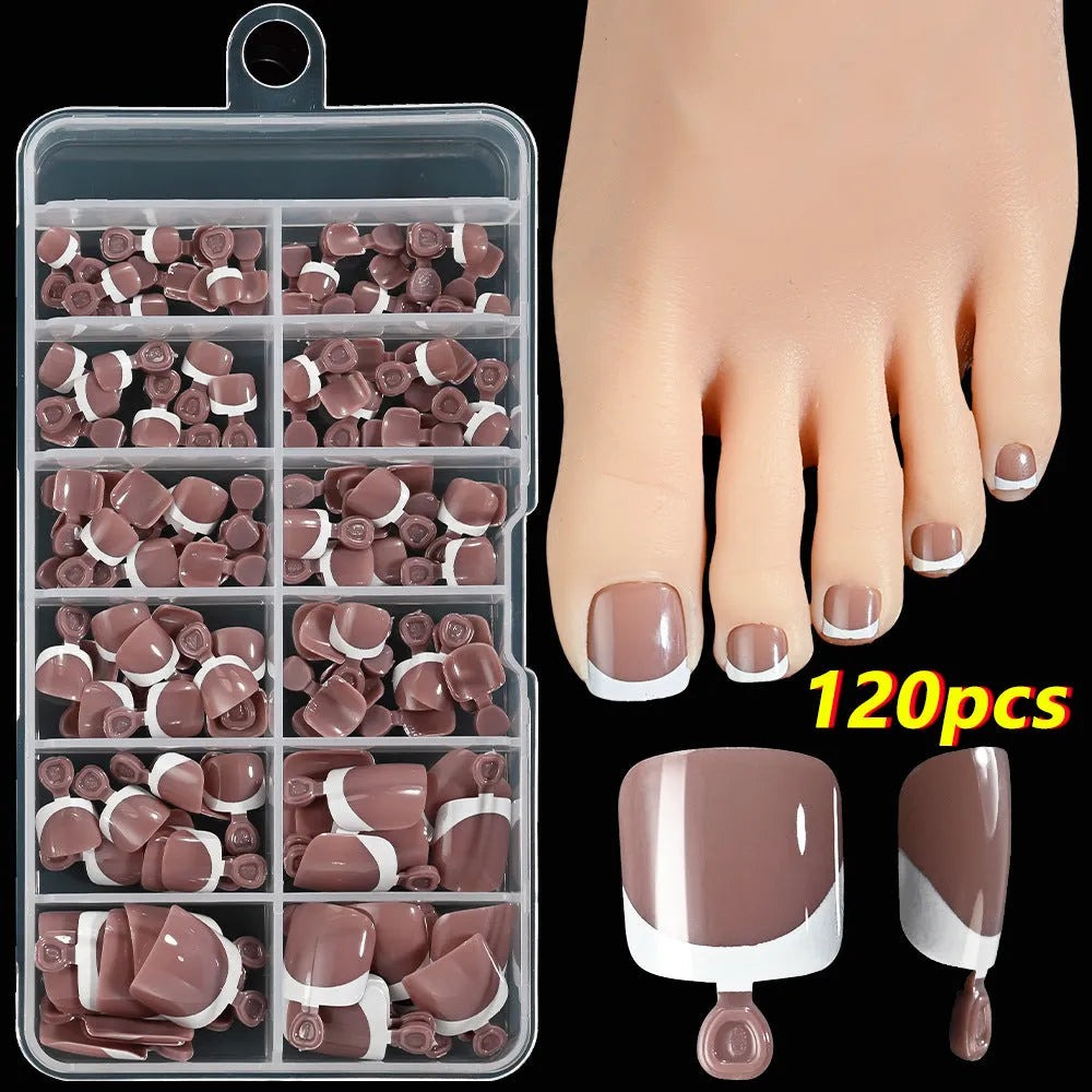 Box of 120 French white edge nude full square short artificial nail pieces showing nine colour shades