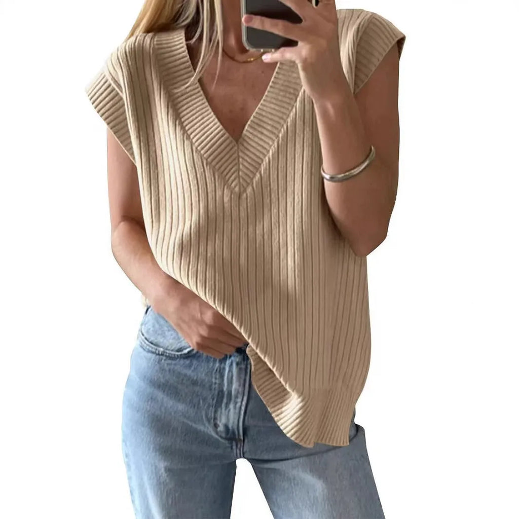 A woman's camel-coloured loose V-neck sleeveless vest with a thin striped pattern, laid flat.