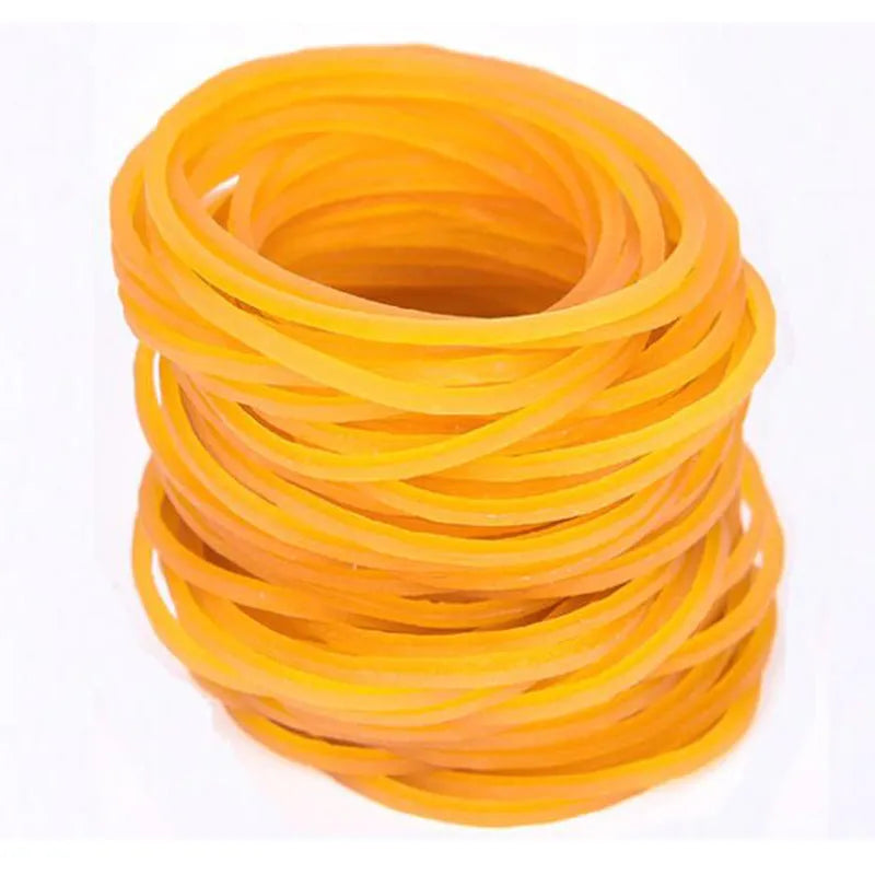 Yellow rubber bands in 500g bulk pack showing multiple diameter sizes from 25mm to 70mm