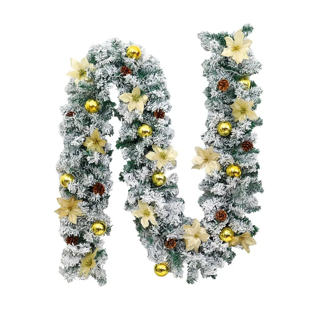 Flocked PVC rattan vine Christmas garland decoration in a festive colour, draped over a mantelpiece.
