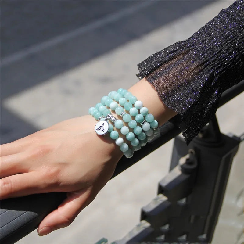 Natural stone women's bracelet with angel echeveria and lotus charm on wrist