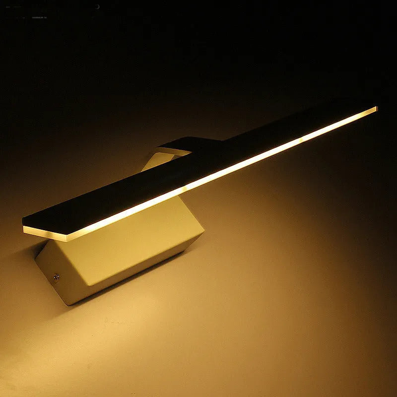 A white rectangular LED bathroom wall mirror with integrated dimmable tri-colour lighting, shown at 580mm long.