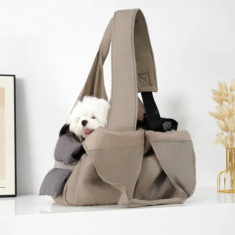 Apricot coloured cloth pet handbag with breathable mesh, shown with dimensions 41cm by 16cm by 28cm
