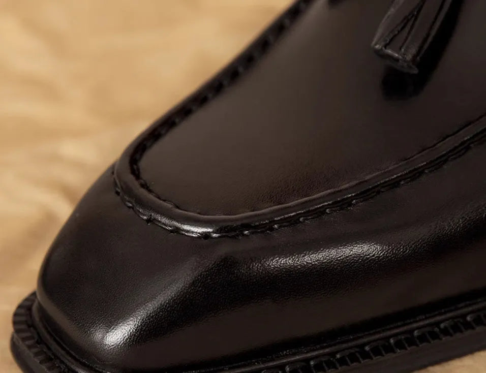 Men's British-style genuine leather slip-on loafers with fringed design in black or brown