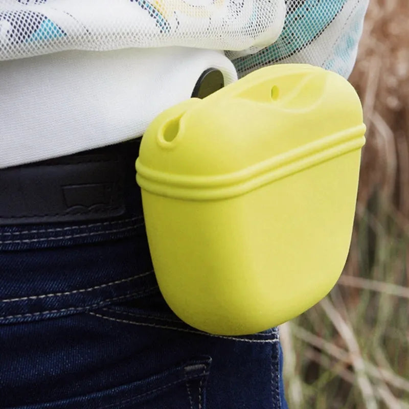 Silicone dog treat bag with clip attachment showing magnet closure and food-grade construction