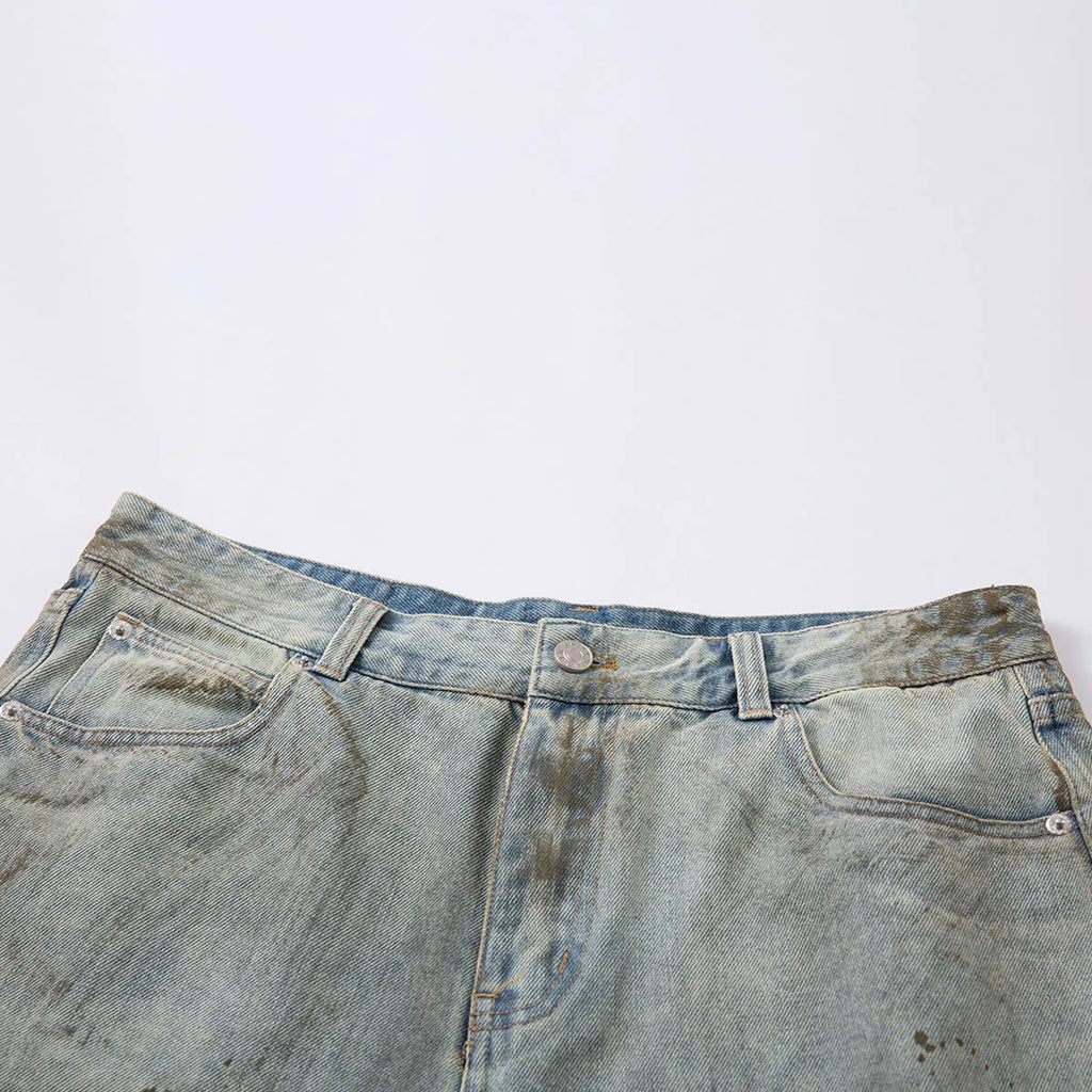 Blue washed denim cropped trousers with straight leg and zip fly, street fashion style