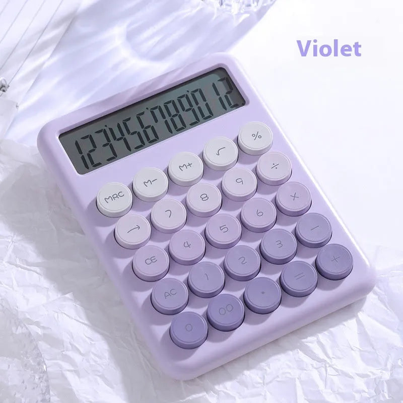Dopamine gradient colour desk calculator in violet, pink, blue, or mint green on a desk.