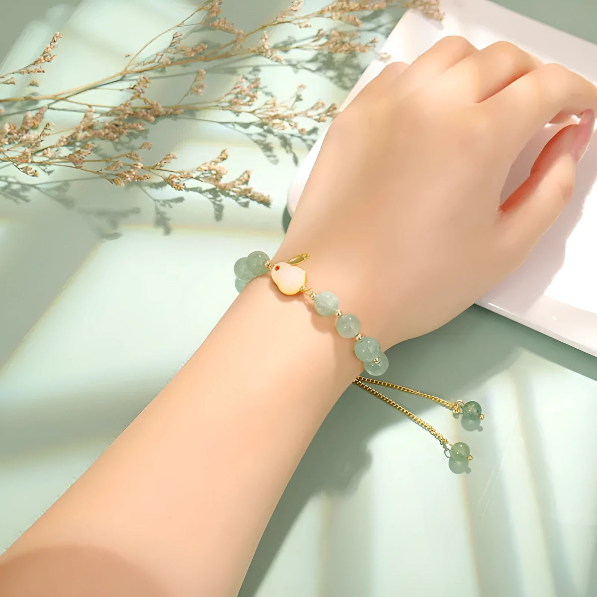 Rabbit bracelet with natural stone charms including green aventurine or strawberry quartz options with mixed metal components