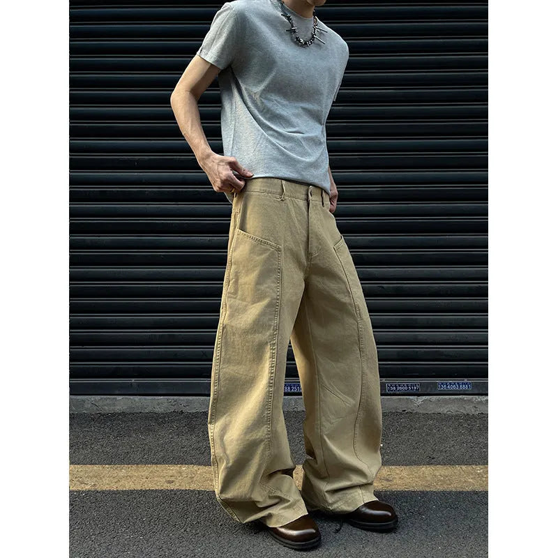 Men's khaki-coloured straight-leg cotton trousers laid flat, showing American retro casual style.