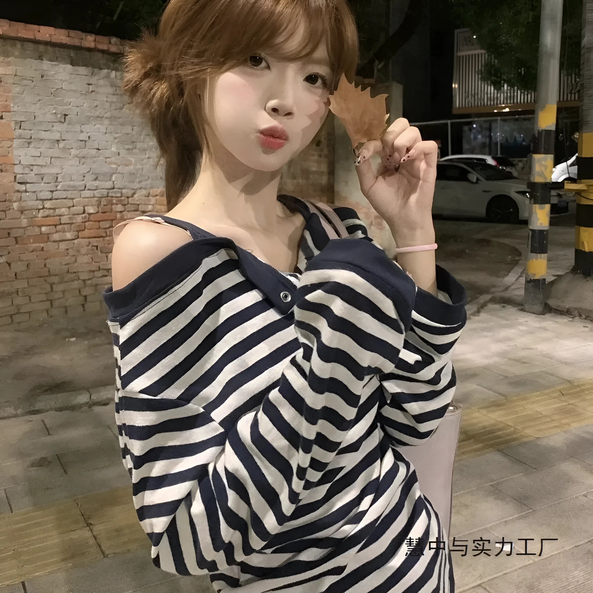 Dark blue oversized women's long-sleeved T-shirt with viscose fibre, featuring striped embroidery and button details in Korean style.