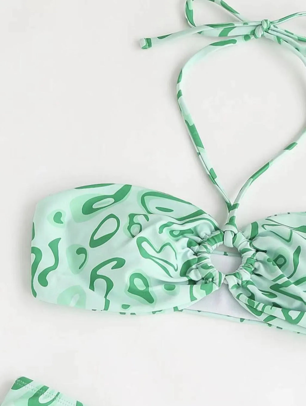 Women's floral bandeau bikini swimsuit in blue with split hipster design