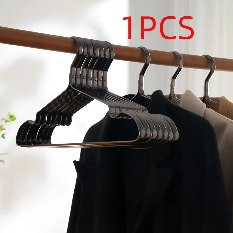 Elegant black clothes hanger with non-slip surface and anti-rust construction for trousers and ties