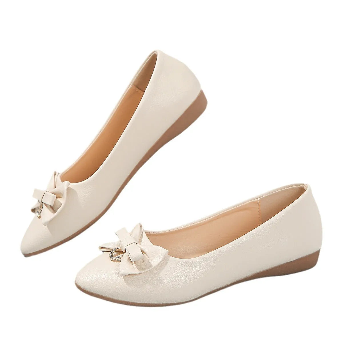 Women's beige casual flat shoes with a bowknot detail, shallow mouth, round toe, and flat rubber sole.