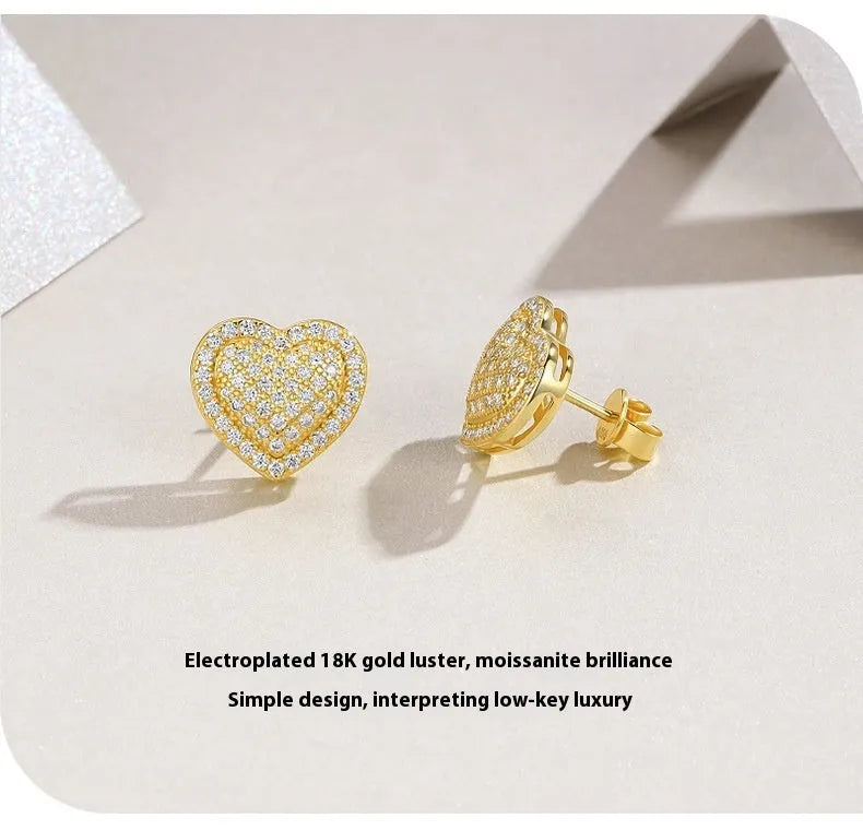 Gold heart-shaped stud earrings with moissanite stones on S925 silver