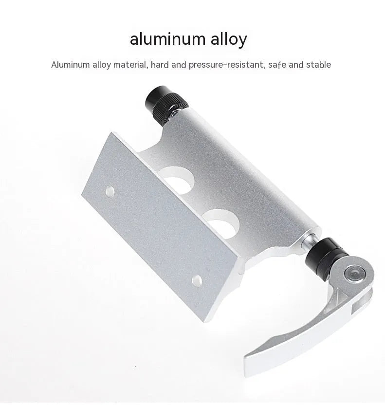 Silver metal bicycle front fork quick release fixing clip for accessory mounting