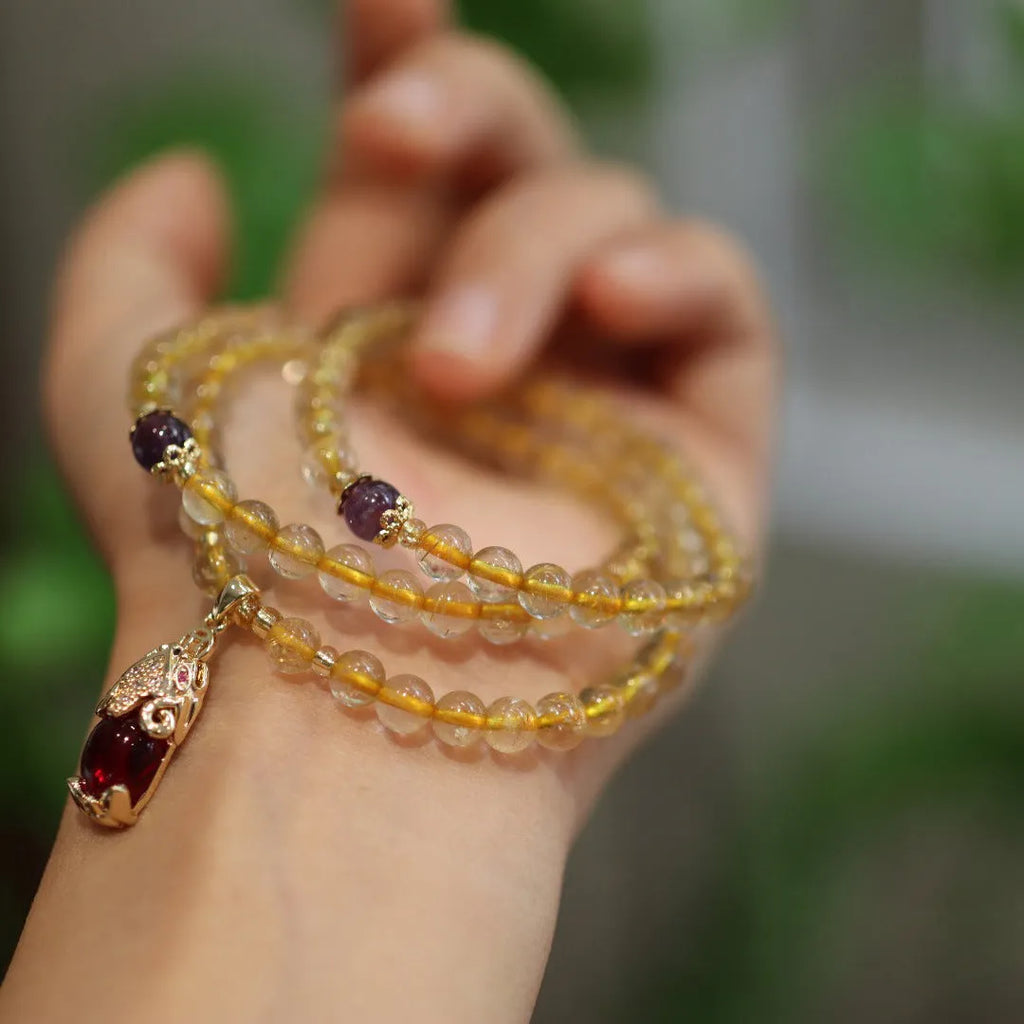Natural Brazilian gold rutilated quartz Chinese-style bracelet with three-circle gold ruby quartz charm pendant