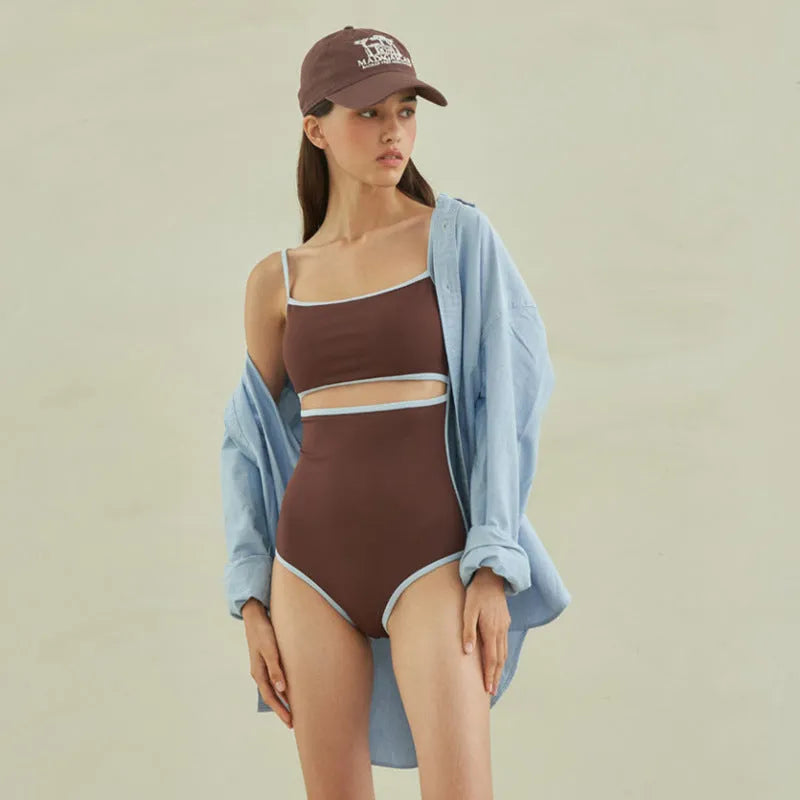 Brown women's triangle top one-piece swimsuit in nylon fabric showing front design