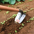 Flat agricultural pointed hoe with a steel horse tip, made from manganese and stainless steel.