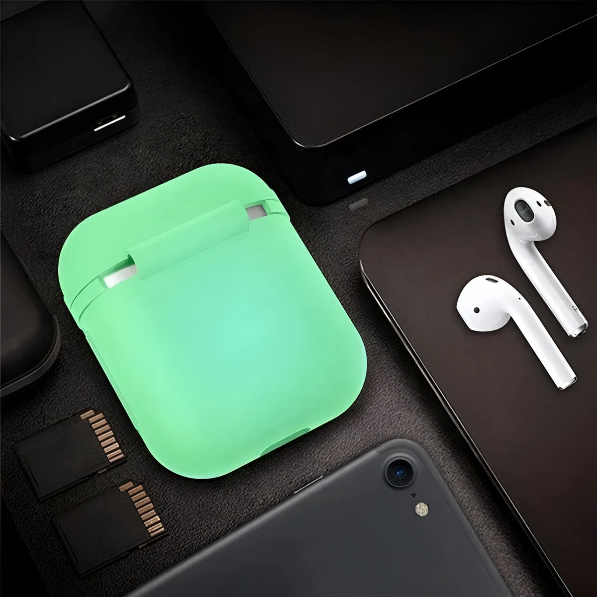 Luminous solid colour silicone flip-open protective case for Apple AirPods.