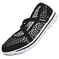 Women's beige lace-up casual flat shoes with mesh upper and round toe.