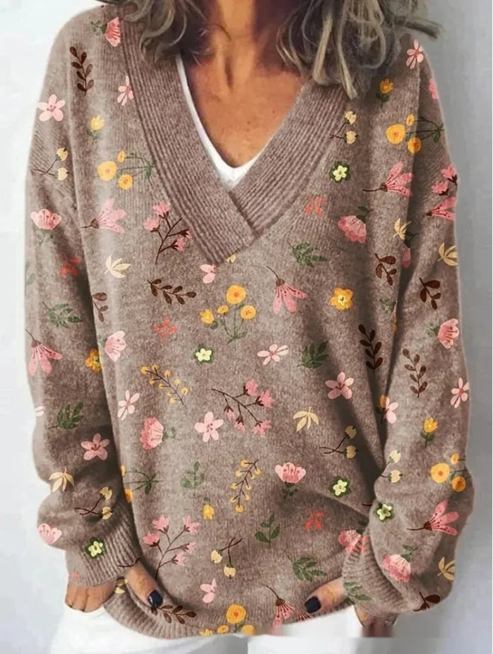 Women's V-neck long sleeve sweatshirt with a white-based 3D floral print pattern.