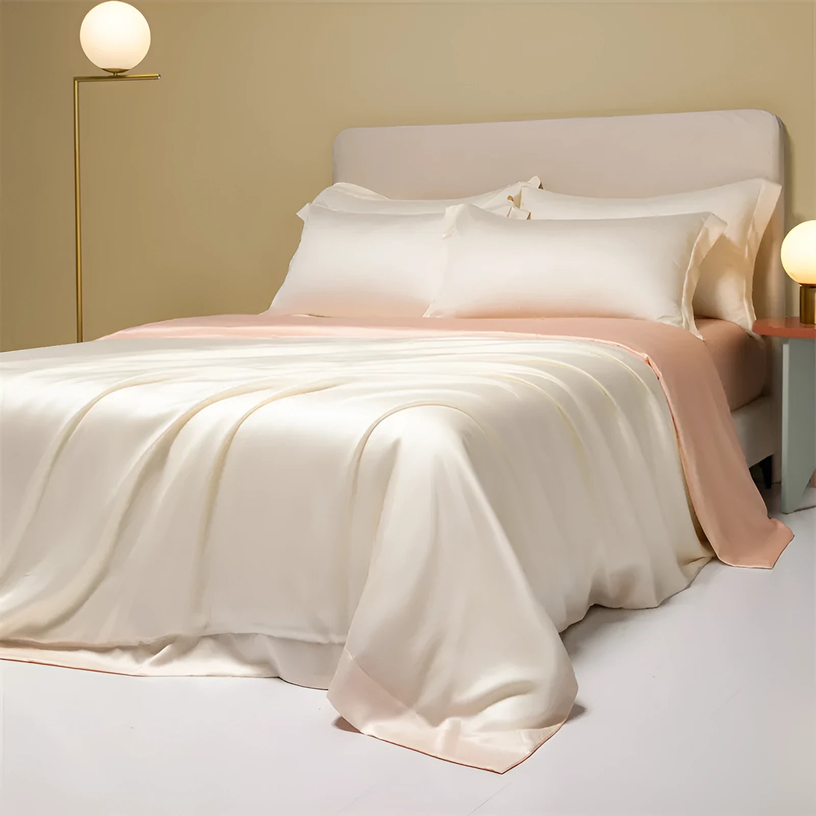Four-piece Lenzing Tencel quilt sheet set in Antique White showing quilt cover and pillowcases with modern simple style