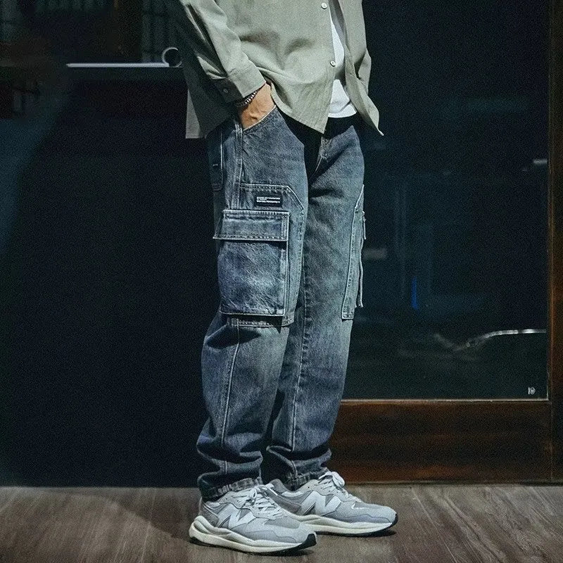 Men's blue loose straight leg stretch jeans with zip fly opening in casual retro style