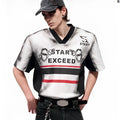 Women's short sleeve V-neck top with a grey letter snake pattern print and padded shoulders.