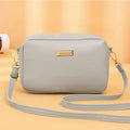 Women's solid colour PU shoulder bag in urban simplicity style with three-dimensional pocket